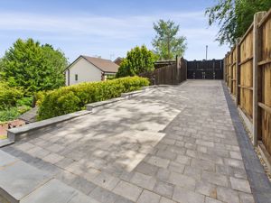 SECURE DRIVEWAY BEHIND GATES- click for photo gallery